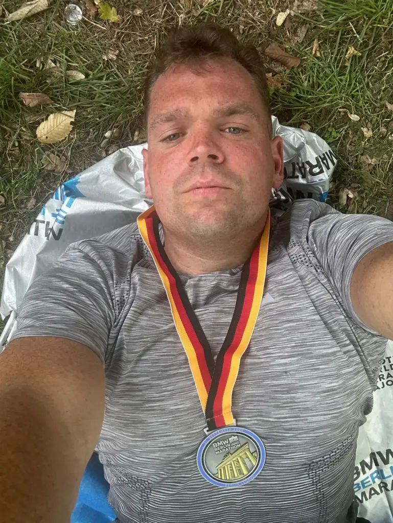Berlin marathon finisher with medal