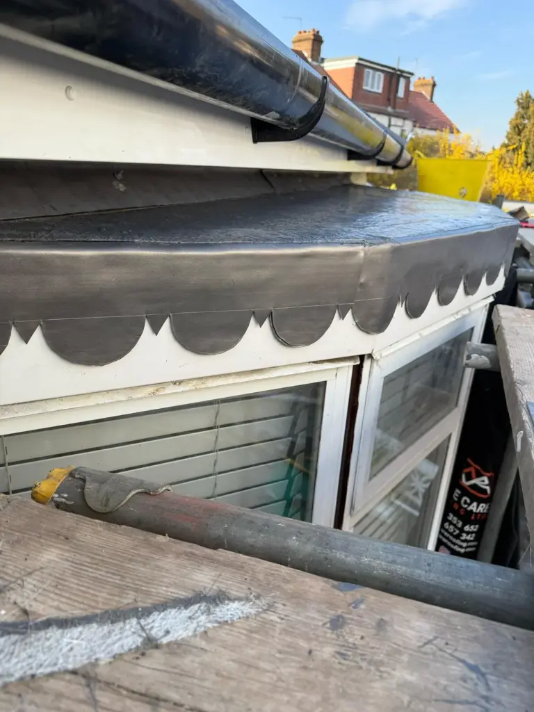 Decorative leadwork roof edge detail