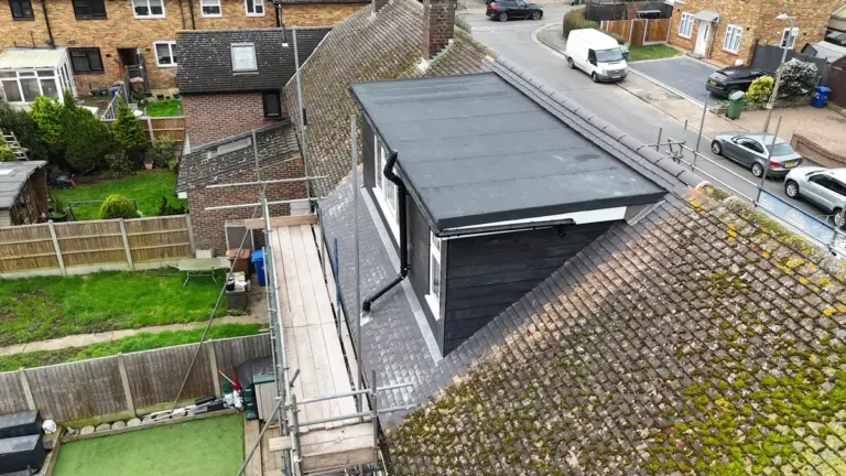 Flat roof dormer installation site view
