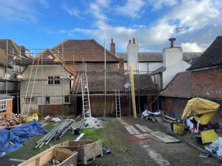 Scaffolded roof repair worksite